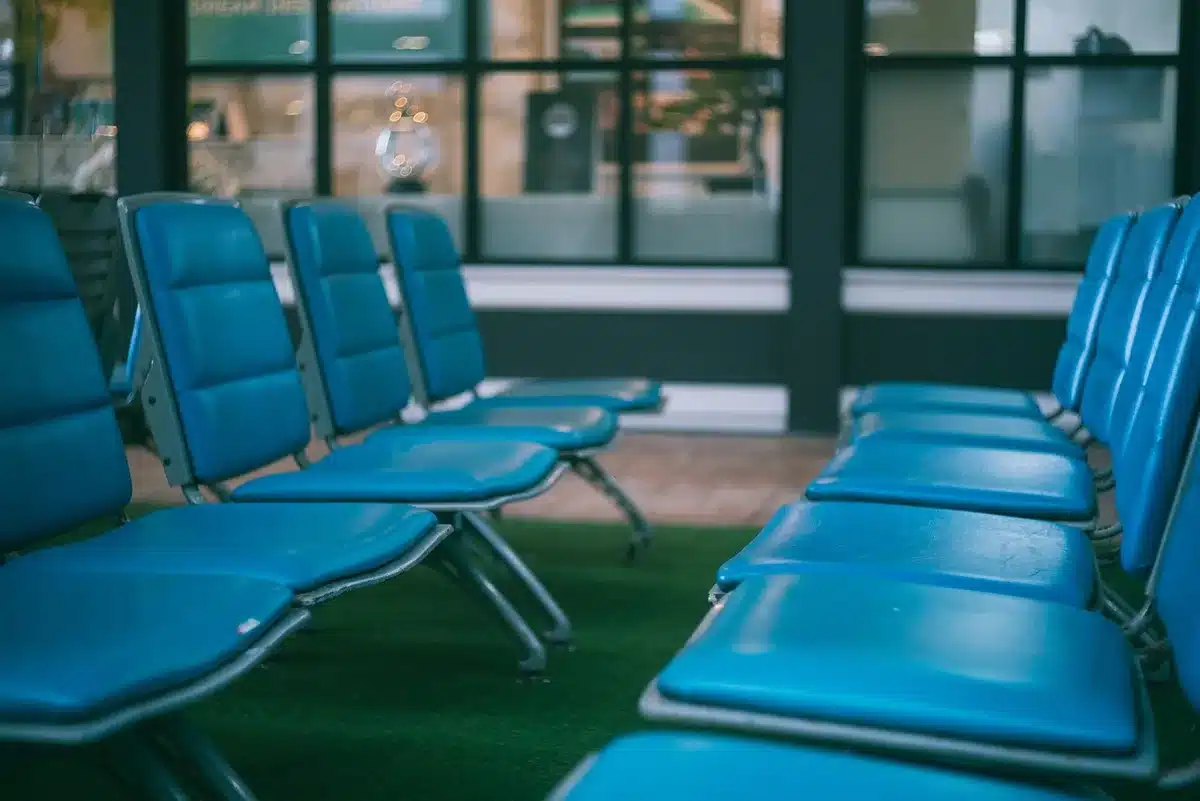 Jacket left on a chair in a busy airport café