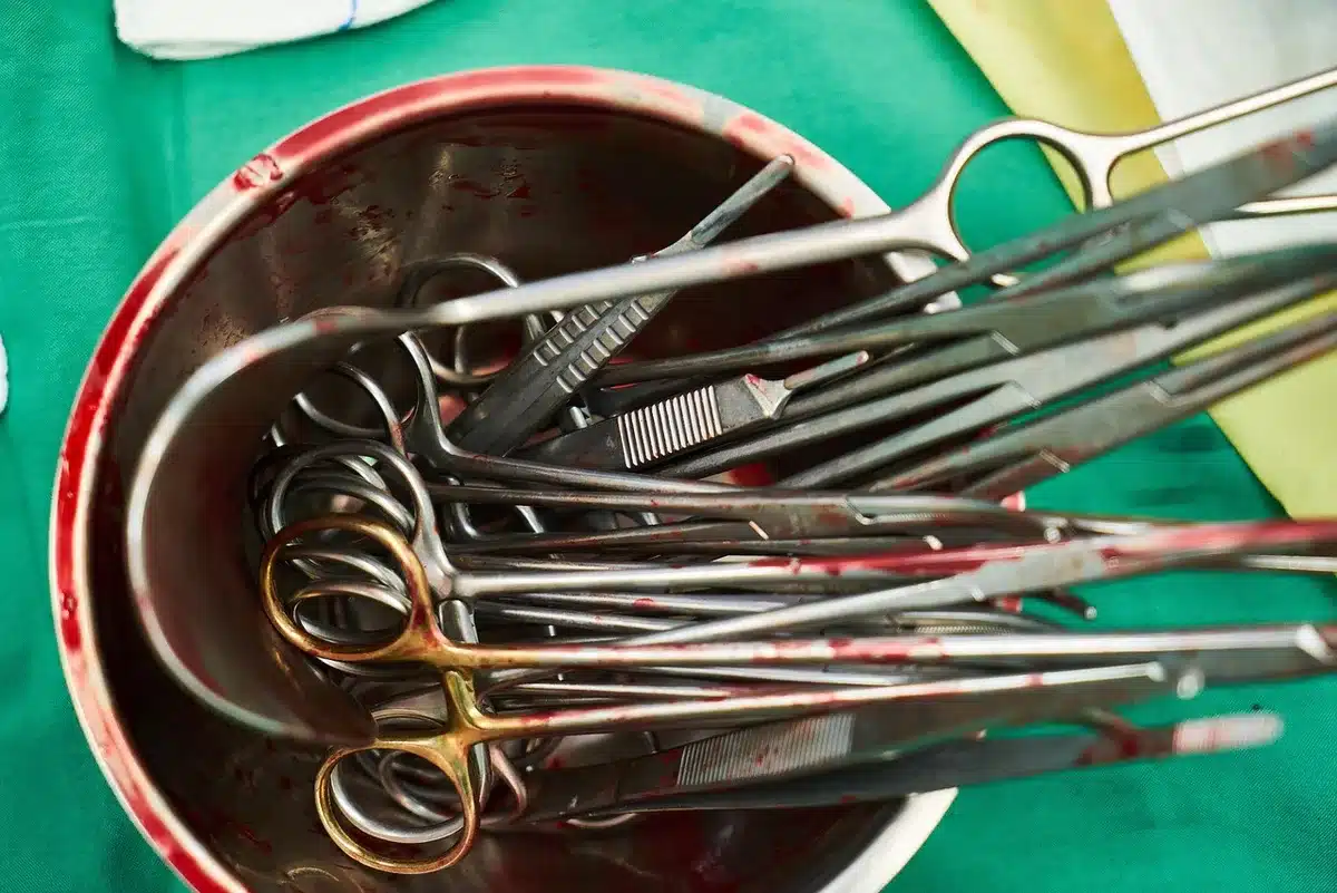 Surgeons and medical team performing head surgery in operating room